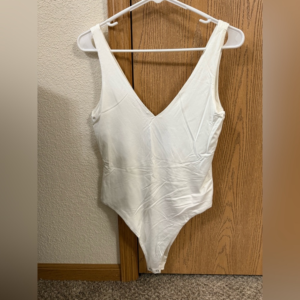 Forever 21 Cream V-Neck bodysuit